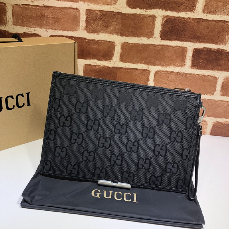 G*u*i clutch bag